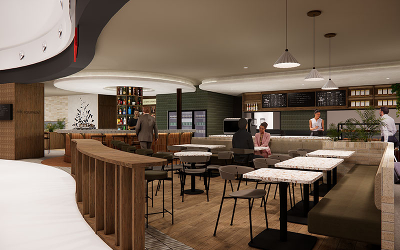 Interior shot of a new bar with ample seating and white tables