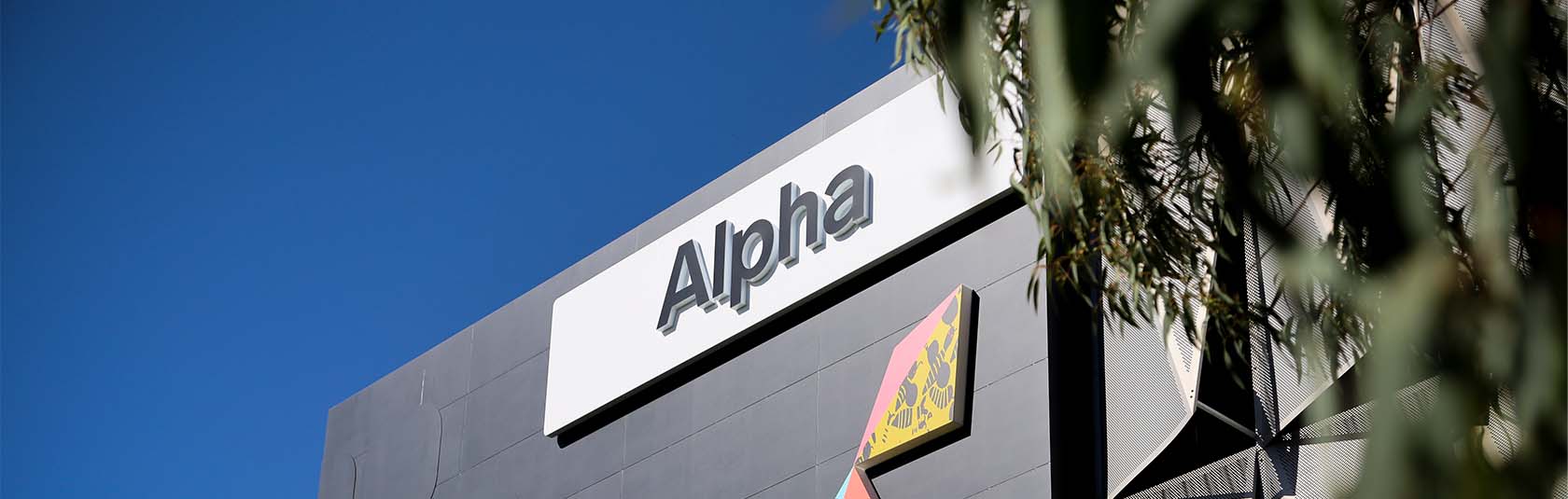ALPHA signage on the Alpha Building at Airport West